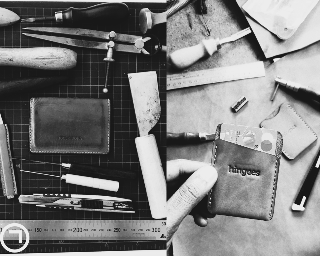 leather crafting tools and handmade wallet on workbench